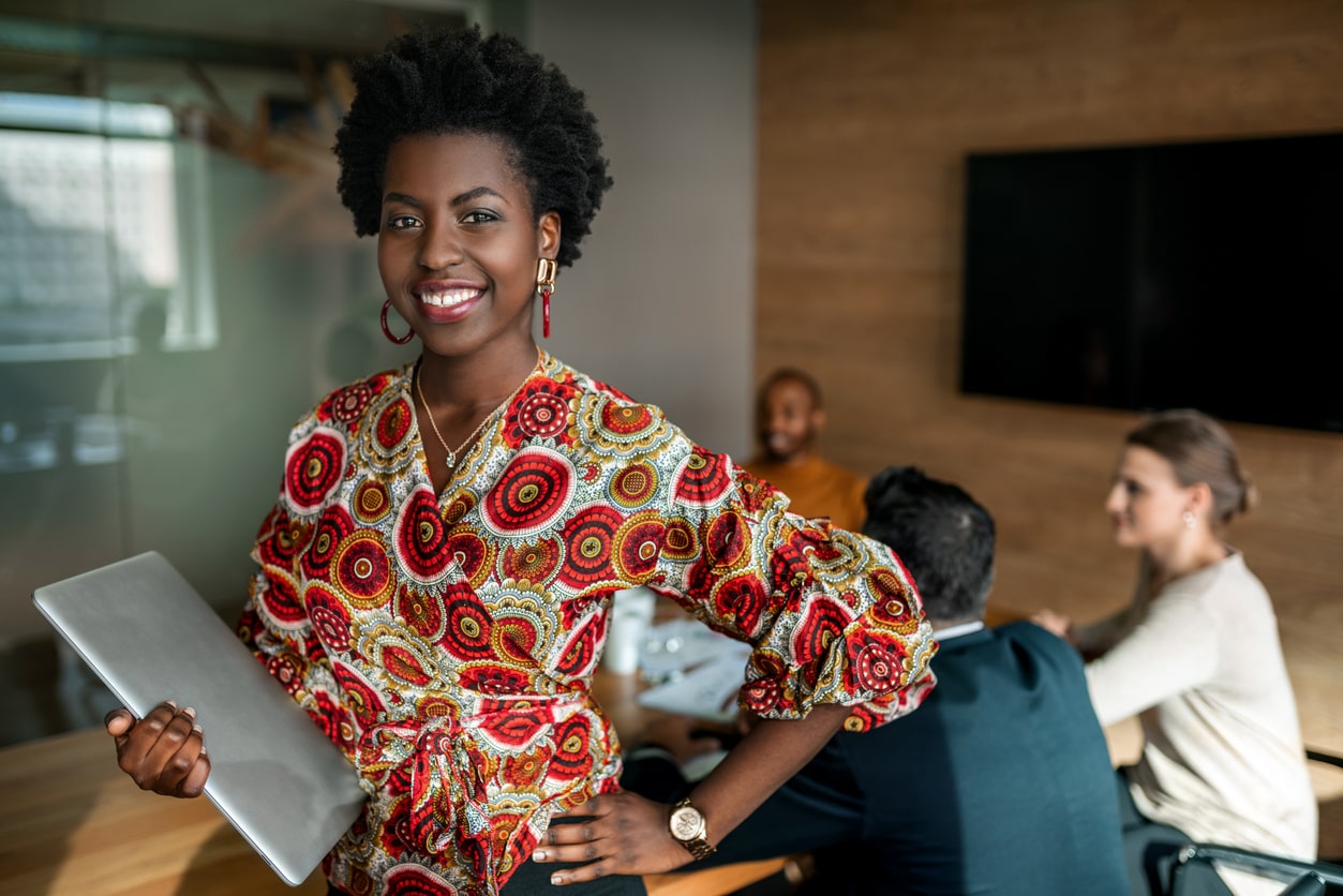 Woman holding a laptop